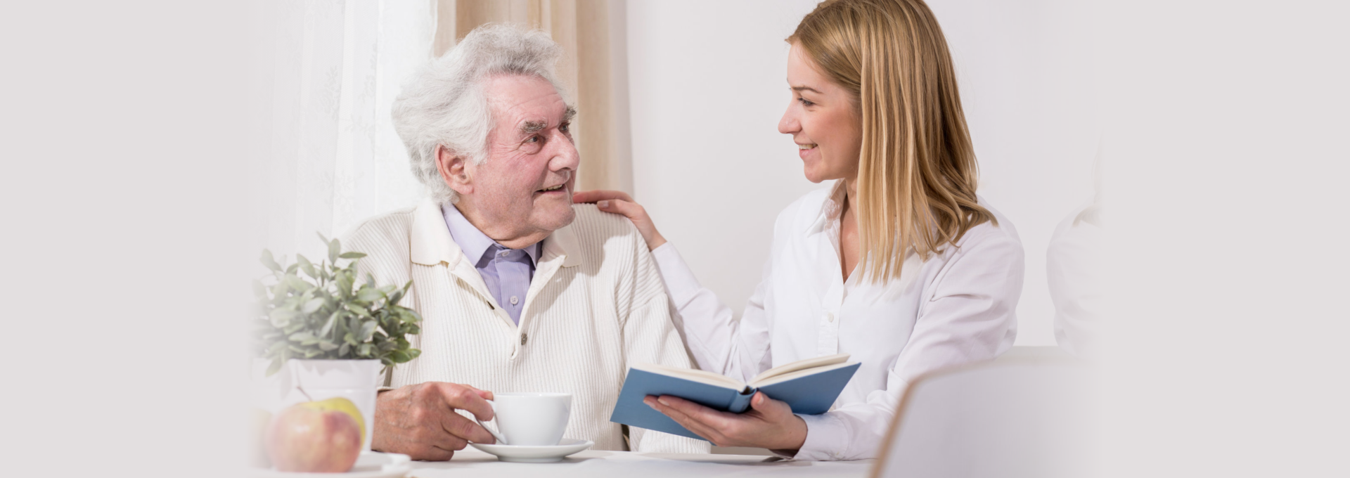 Caregiver and elder talking